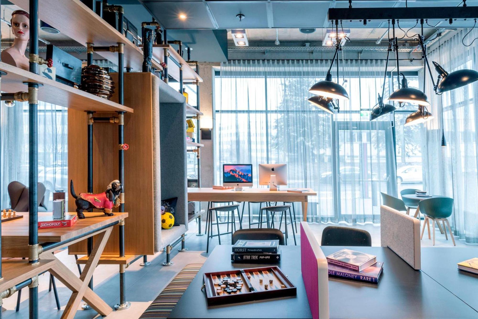 Отель Moxy Munich Messe Ашхайм Экстерьер фото