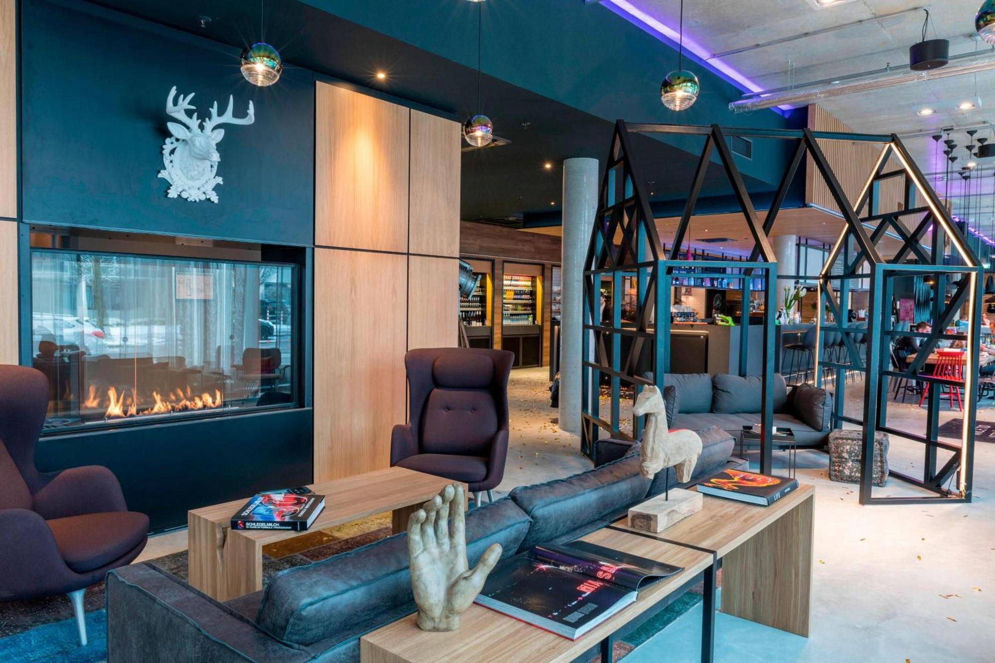 Отель Moxy Munich Messe Ашхайм Экстерьер фото